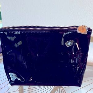 Yves Saint Laurent Black Cosmetic Bag with Gold Accents it reads “Black is Bold”